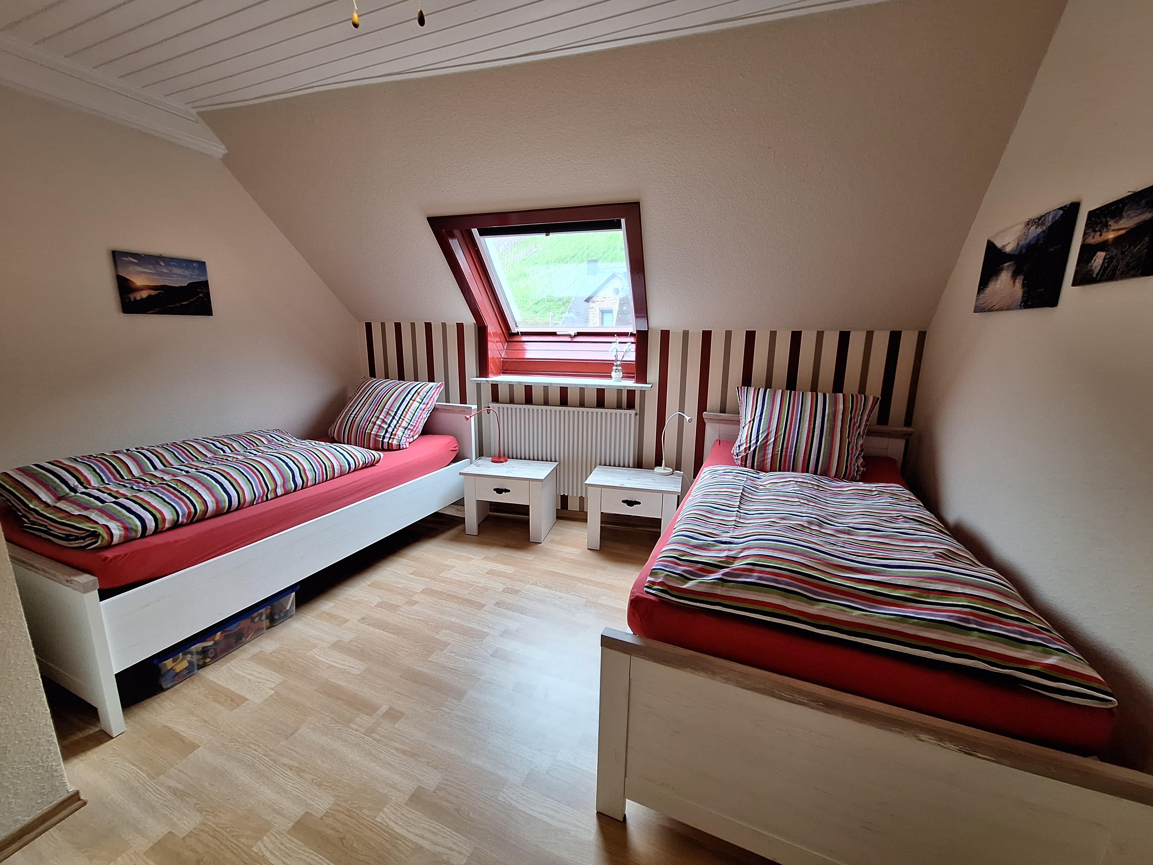 Foto: 2. Schlafzimmer mit 2 getrennten Betten.