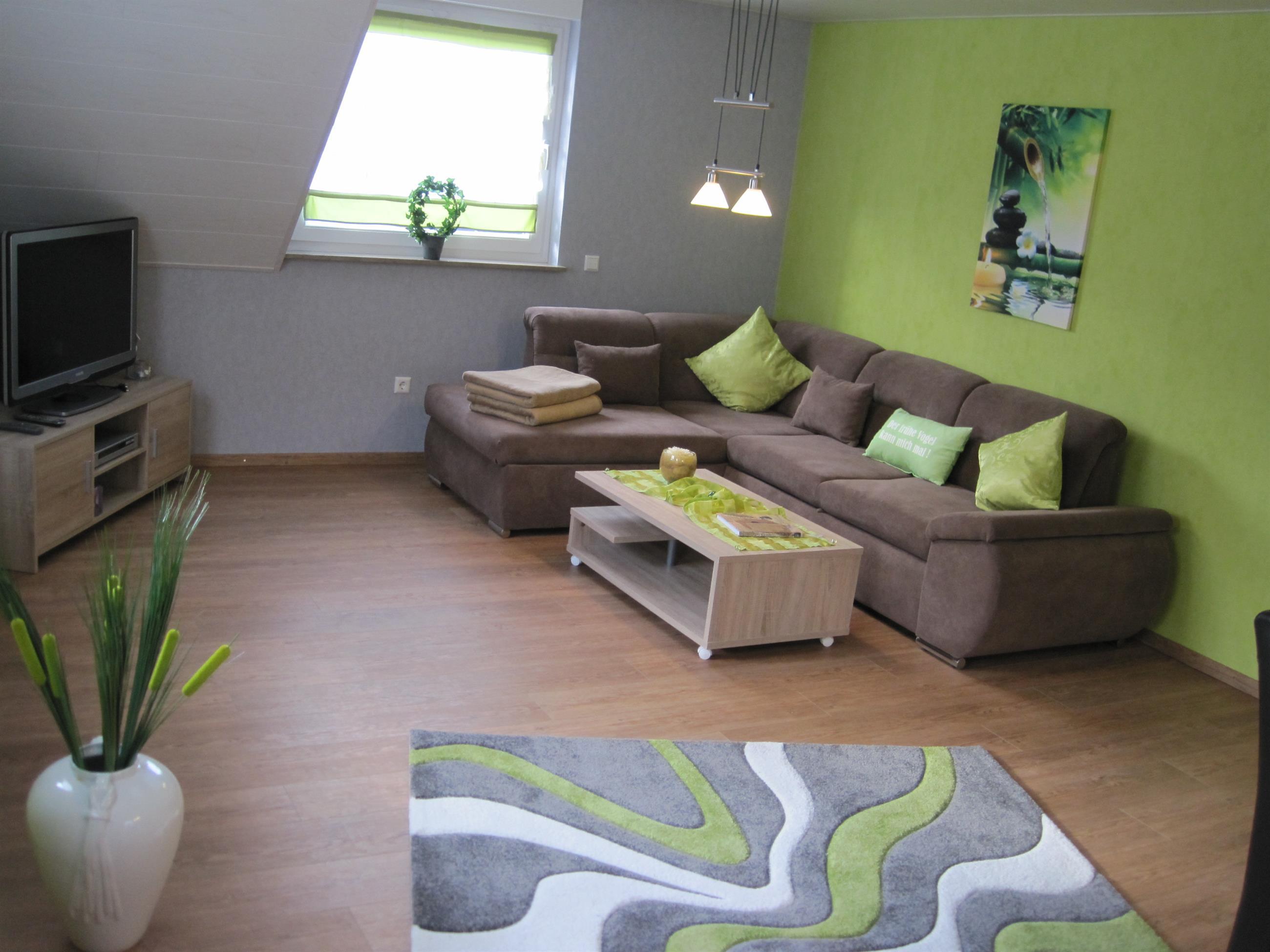 Foto: Wohnzimmer mit Sofalandschaft